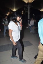Ekta Kapoor snapped at the airport as they return after New year in Mumbai on 1st Jan 2014